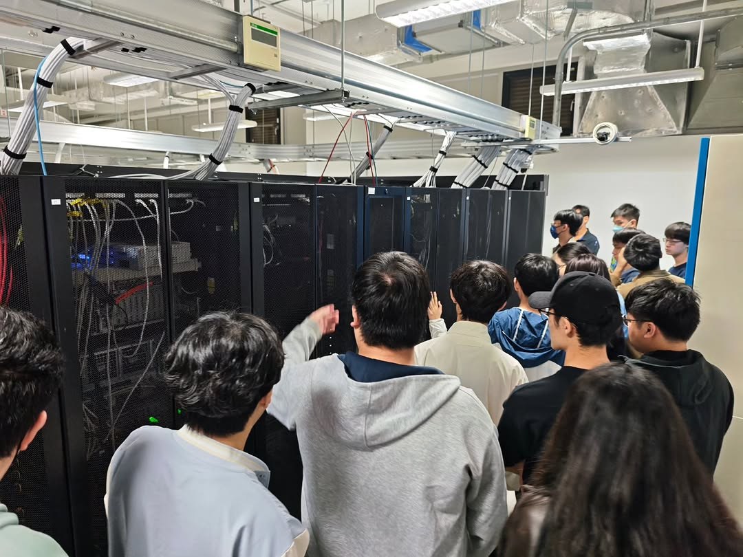Server room overview with rack rows